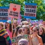 People holding trans rights signs - how to be a cis ally
